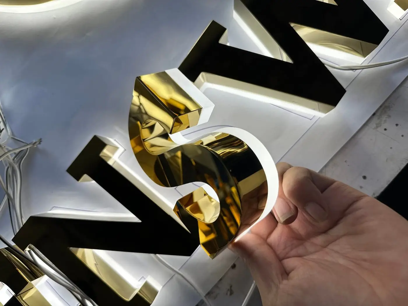 Fabrication of golden stainless steel letters